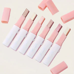 Stick fard à paupières bicolore — illumine le regard pour un look naturel et longue tenue.