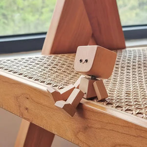 Charmante petite figurine en bois qui se balance avec 12 expressions magnétiques