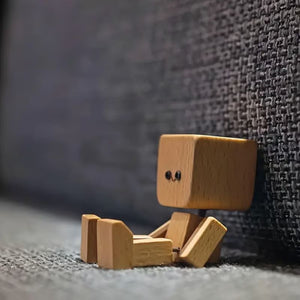 Charmante petite figurine en bois qui se balance avec 12 expressions magnétiques