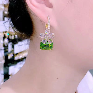 Boucles d'oreilles brillantes fleur verte