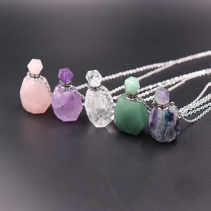 Collier bouteille de parfum en cristal