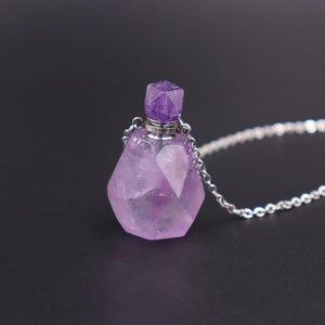 Collier bouteille de parfum en cristal