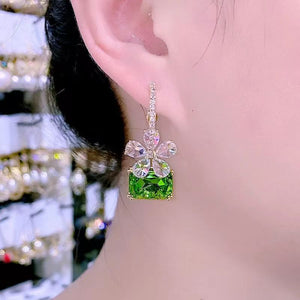 Boucles d'oreilles brillantes fleur verte