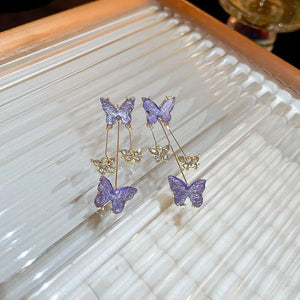 Boucles d'oreilles papillon violet