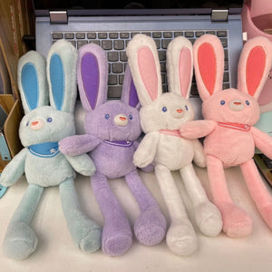 Poupée lapin en peluche